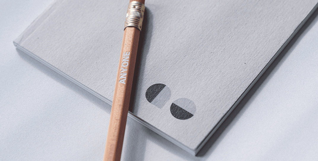 anyone – book and pencil
